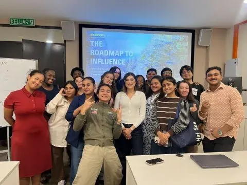 Shubham with a class of students